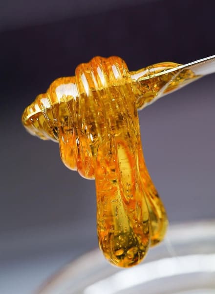 A large glob of cannabis concentrate on a dab tool.